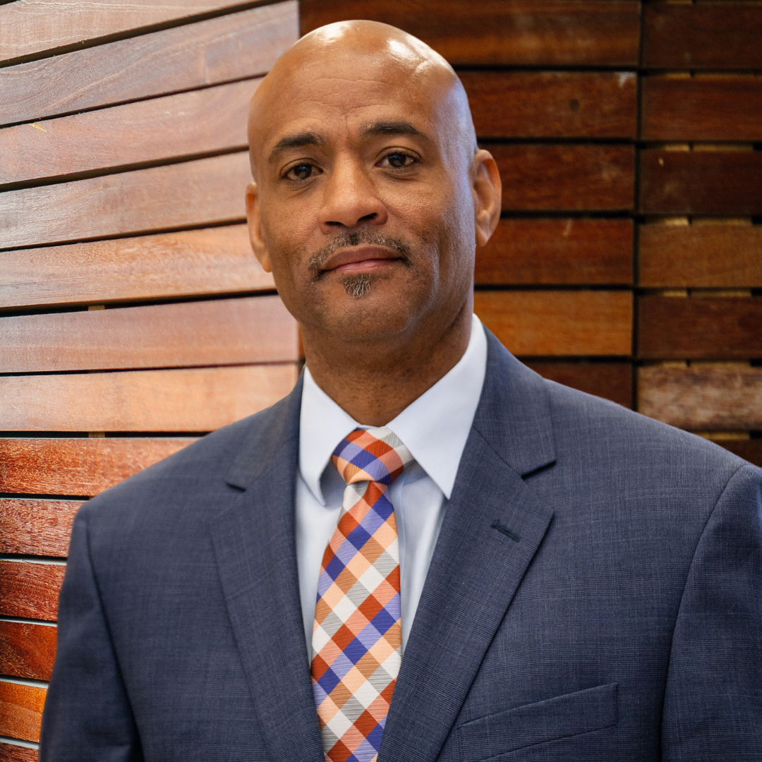 image of busy office with team collaborating (for a fintech company)