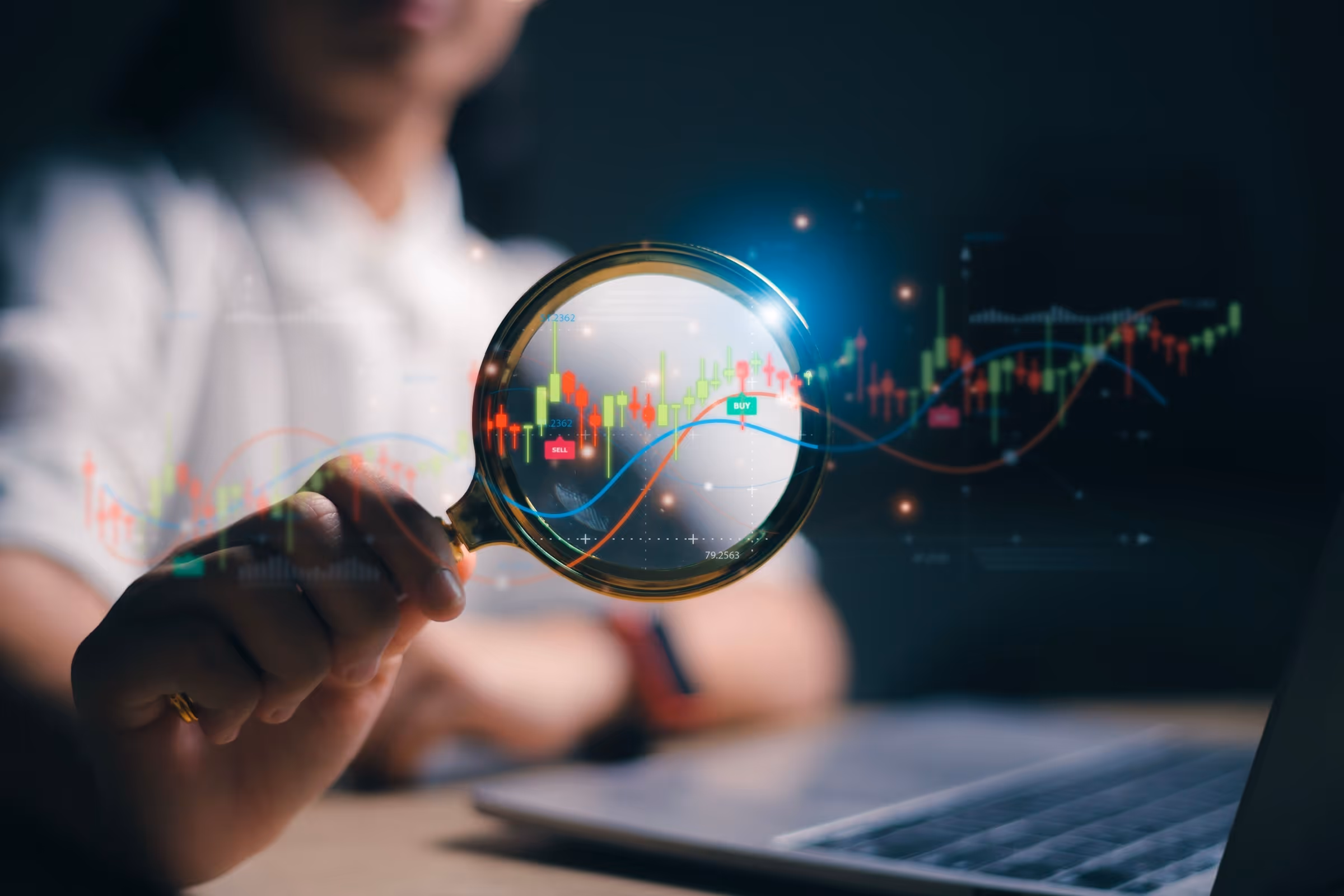Focused trader analyzing stock market charts with a magnifying glass, representing disciplined trading, technical analysis, and careful decision-making.