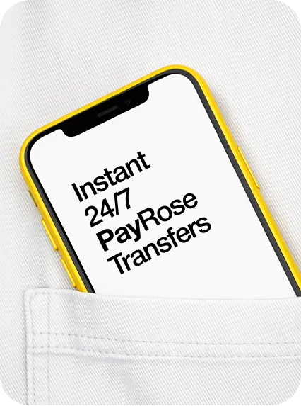 Yellow smartphone with screen text 'Instant 24/7 PayRose Transfers' partially tucked into a white fabric pocket.