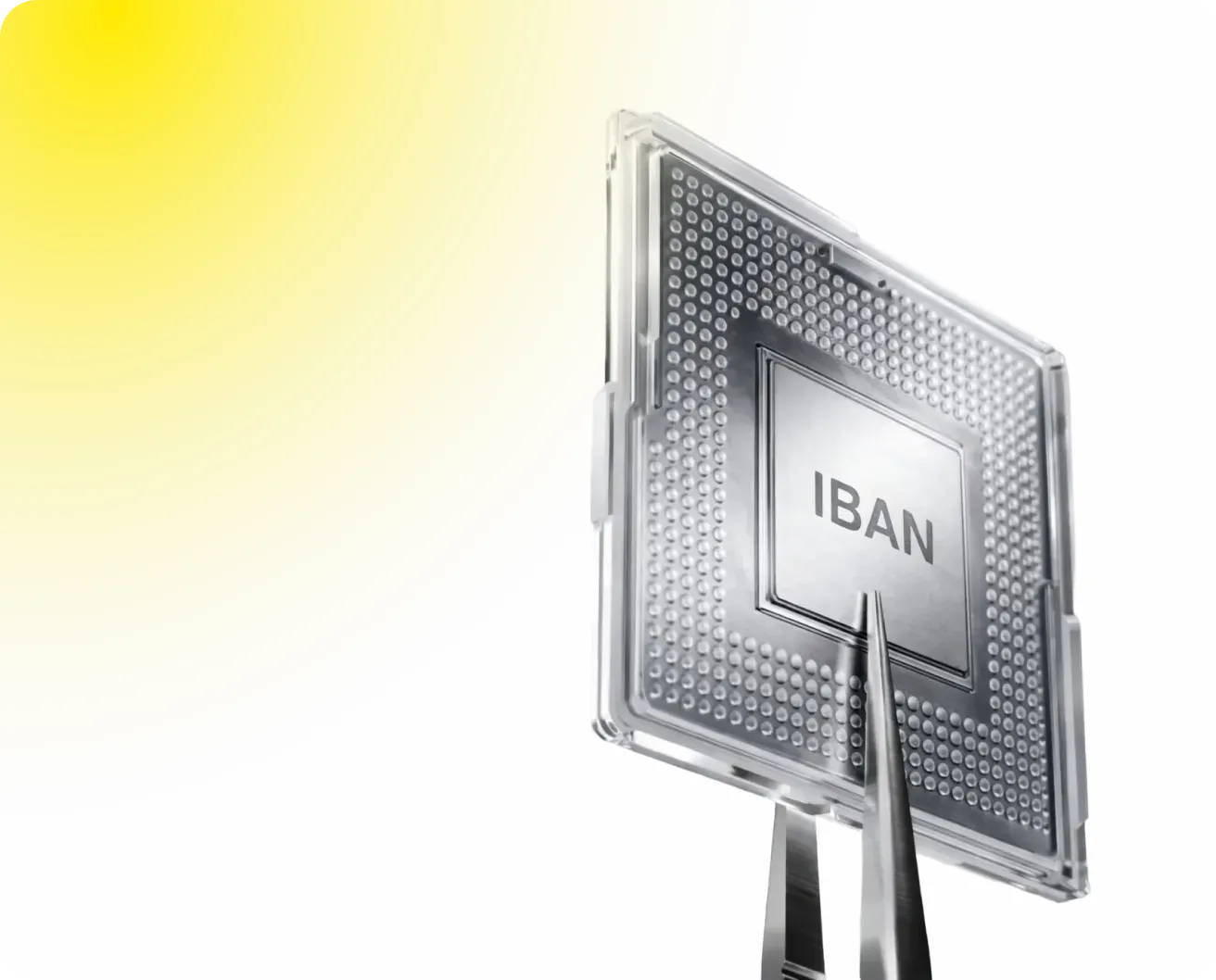 Close-up of a small computer chip labeled 'IBAN' held by tweezers against a white and yellow gradient background.