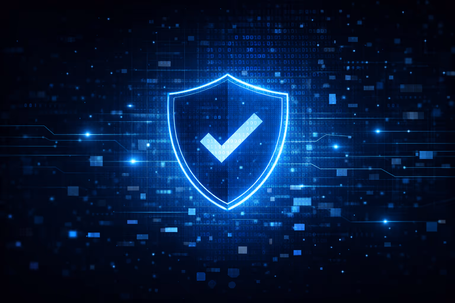 Glowing blue shield with a checkmark symbolizing cybersecurity and data protection.