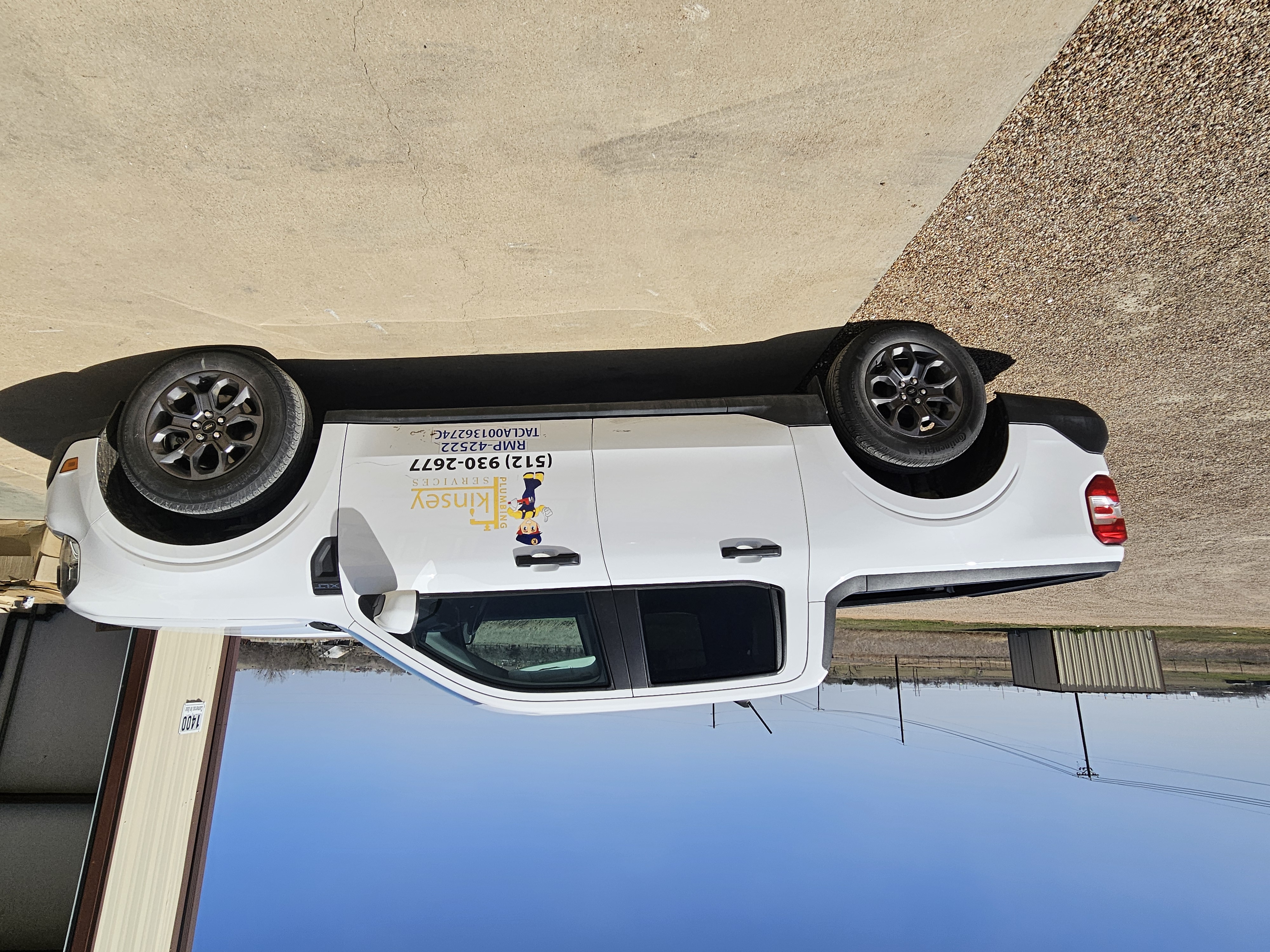 Kinsey Plumbing technician performing smart thermostat installation in Georgetown, TX