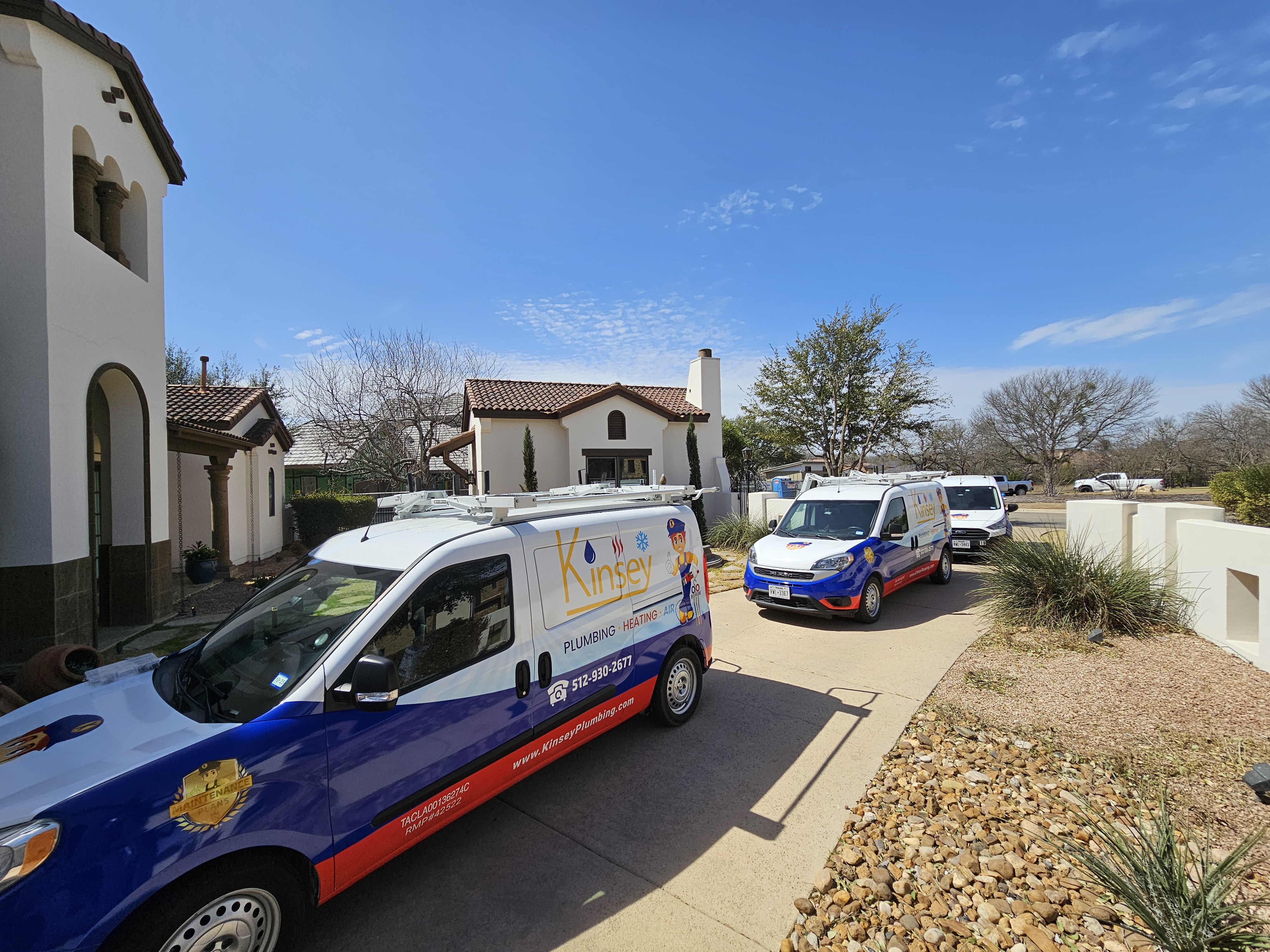 Kinsey technician on a smart thermostats install job in Cedar Park, TX