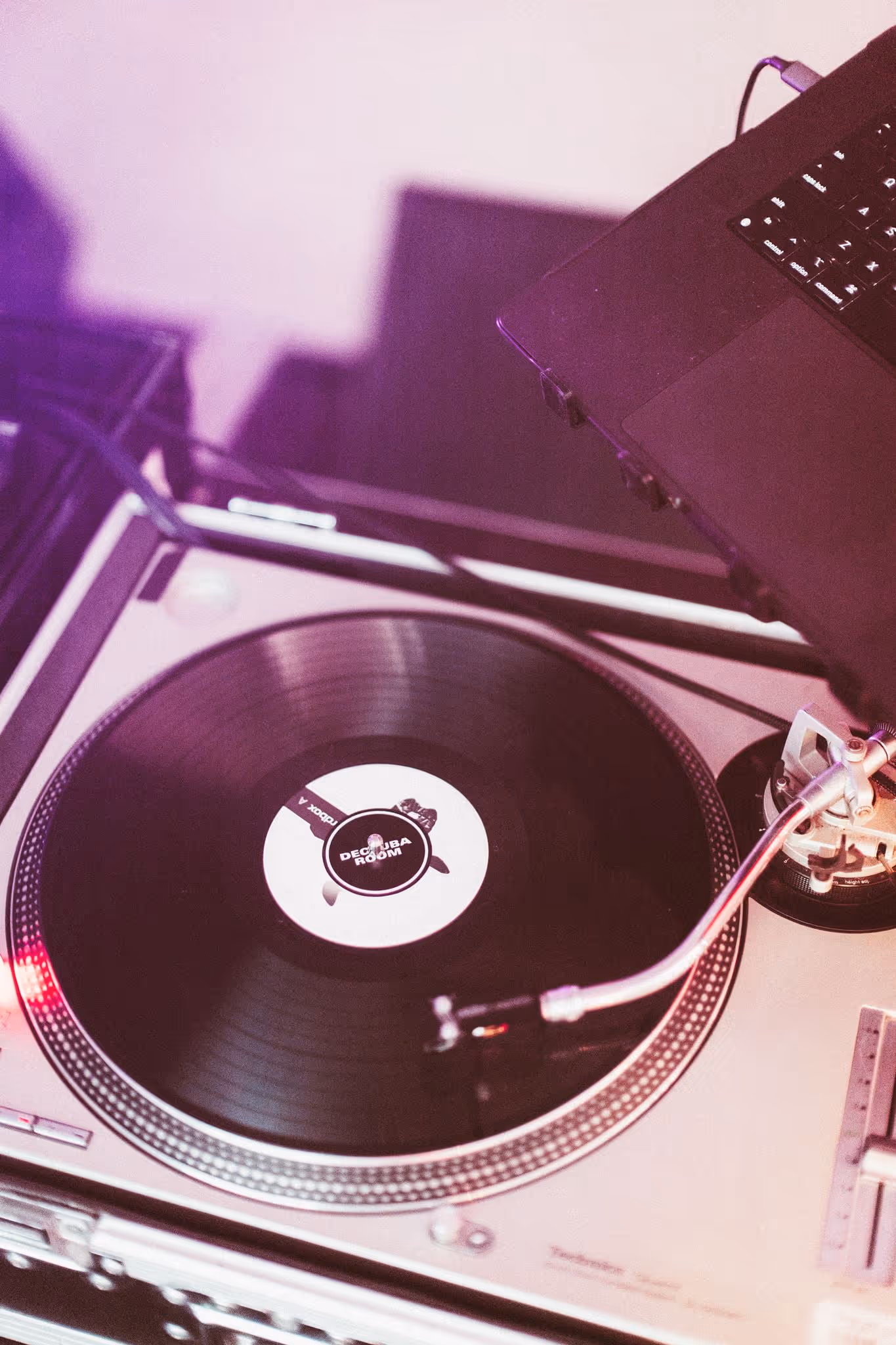 Decjuba-themed vinyl record on turntable