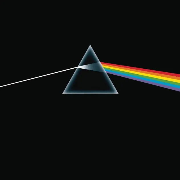 White light beam entering a triangular prism and dispersing into a spectrum of rainbow colors against a black background.
