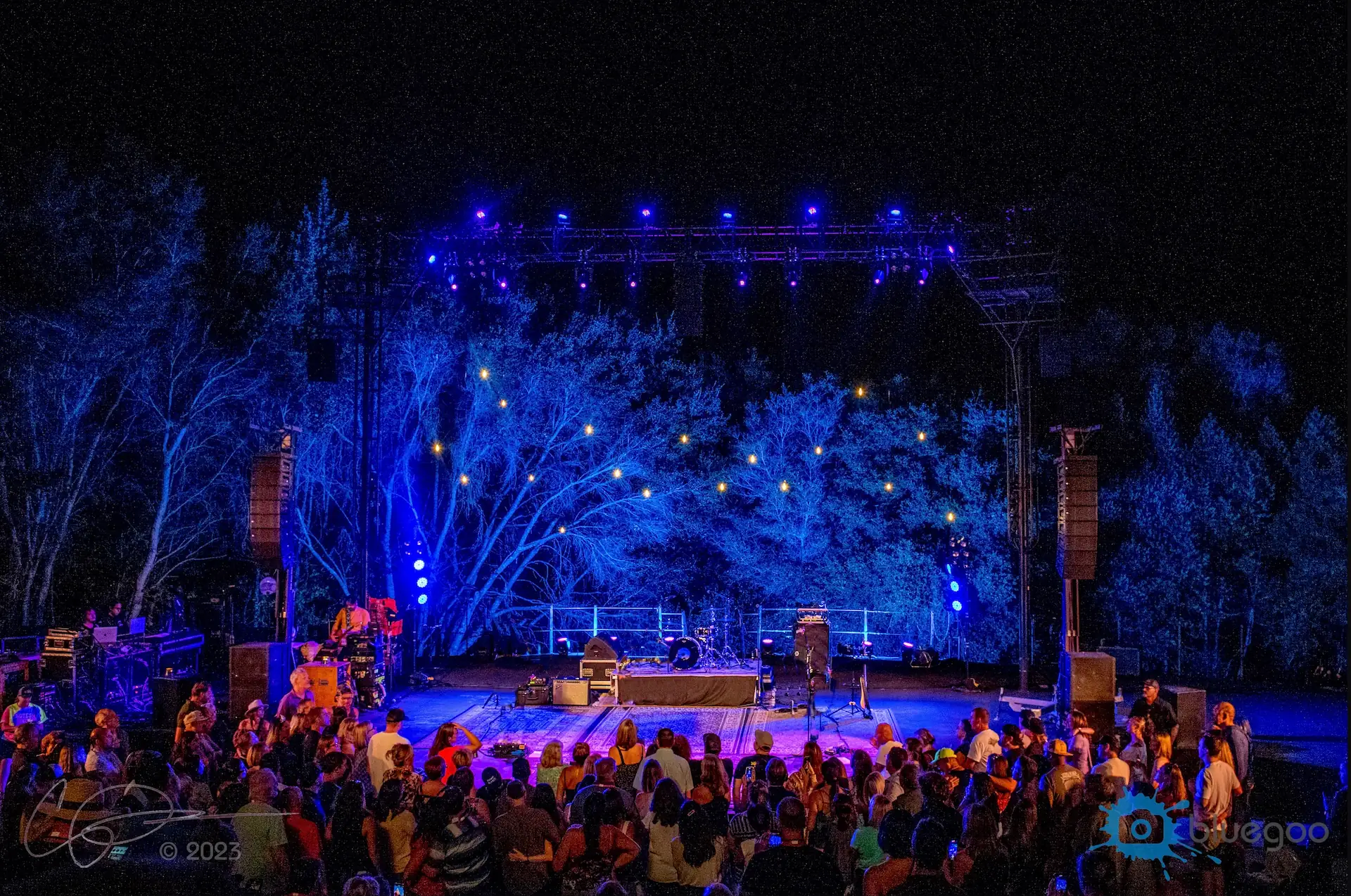 Band performing with green stage lights at Siesta Valley Bowl