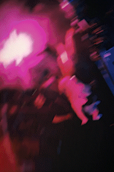 Abstract colorful light streaks in pink, red, and blue tones on a dark background. bandkaroke.live