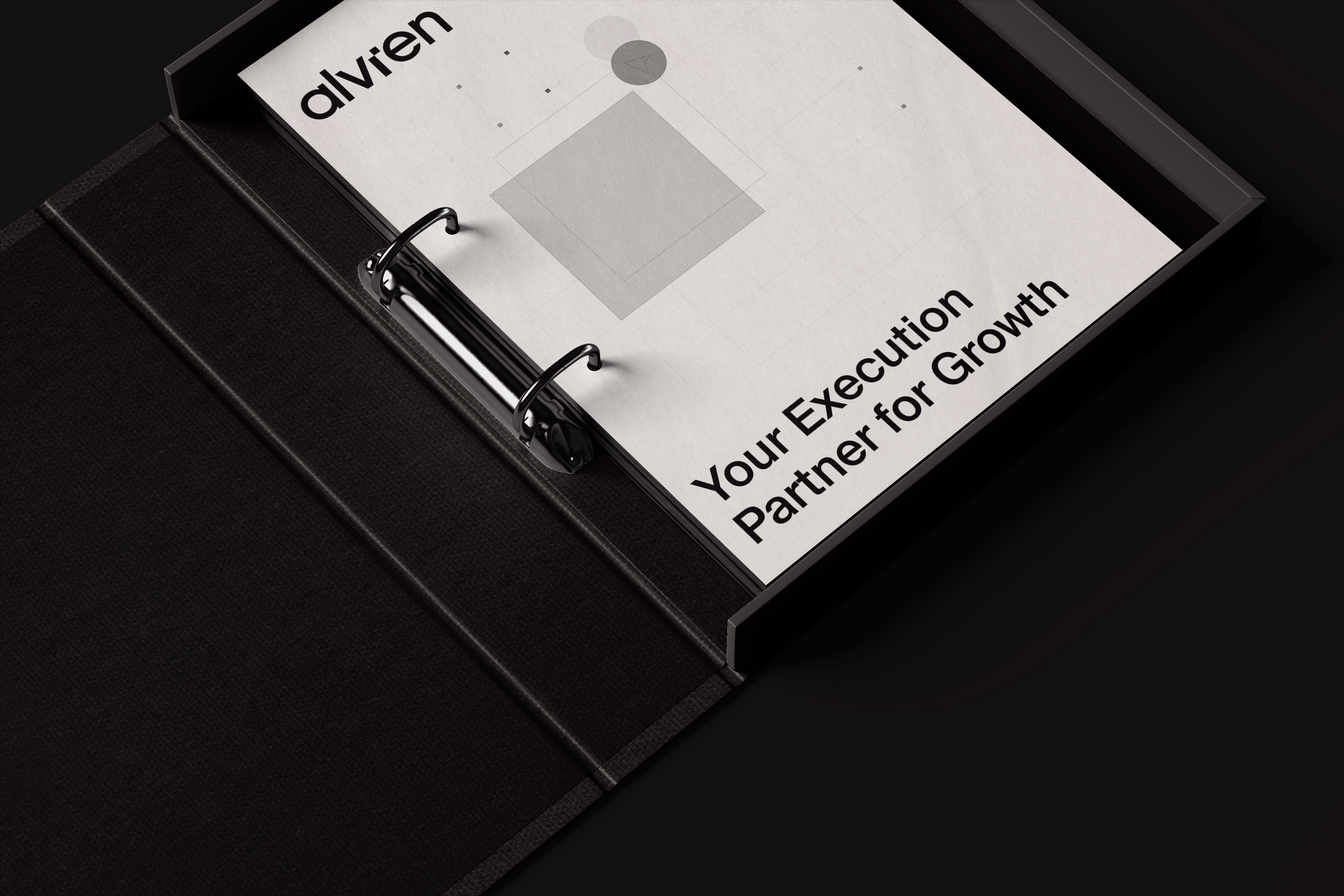A minimalist branding mockup of an open black ring binder box. Inside, a white document features the Alvren logo at the top and the bold text "Your Execution Partner for Growth" at the bottom, accompanied by subtle geometric design elements. 