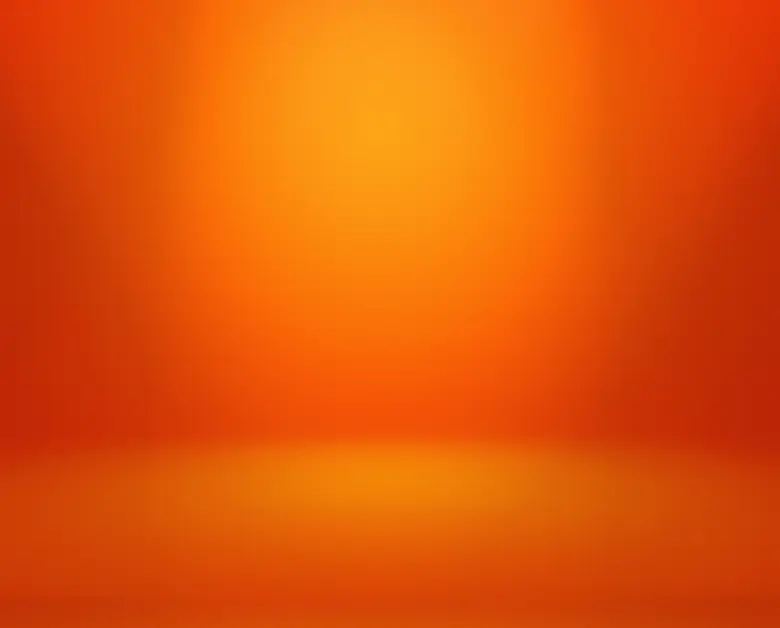 Blurred gradient background with warm orange and yellow tones.
