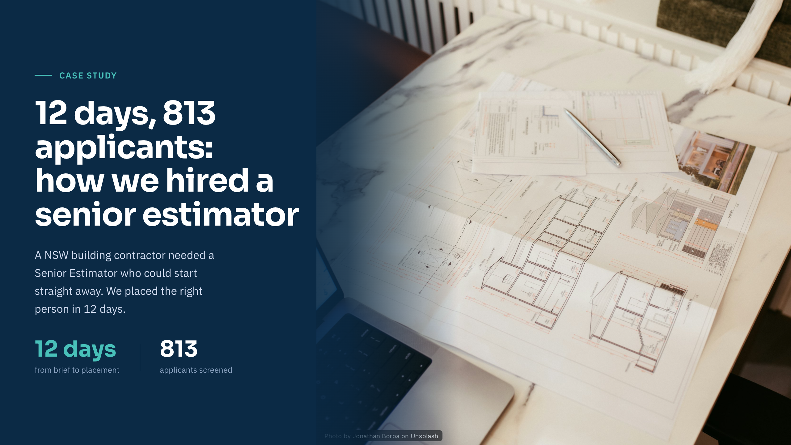 Senior estimator's desk with construction drawings and a laptop showing a cost estimate, in a calm, naturally lit office.