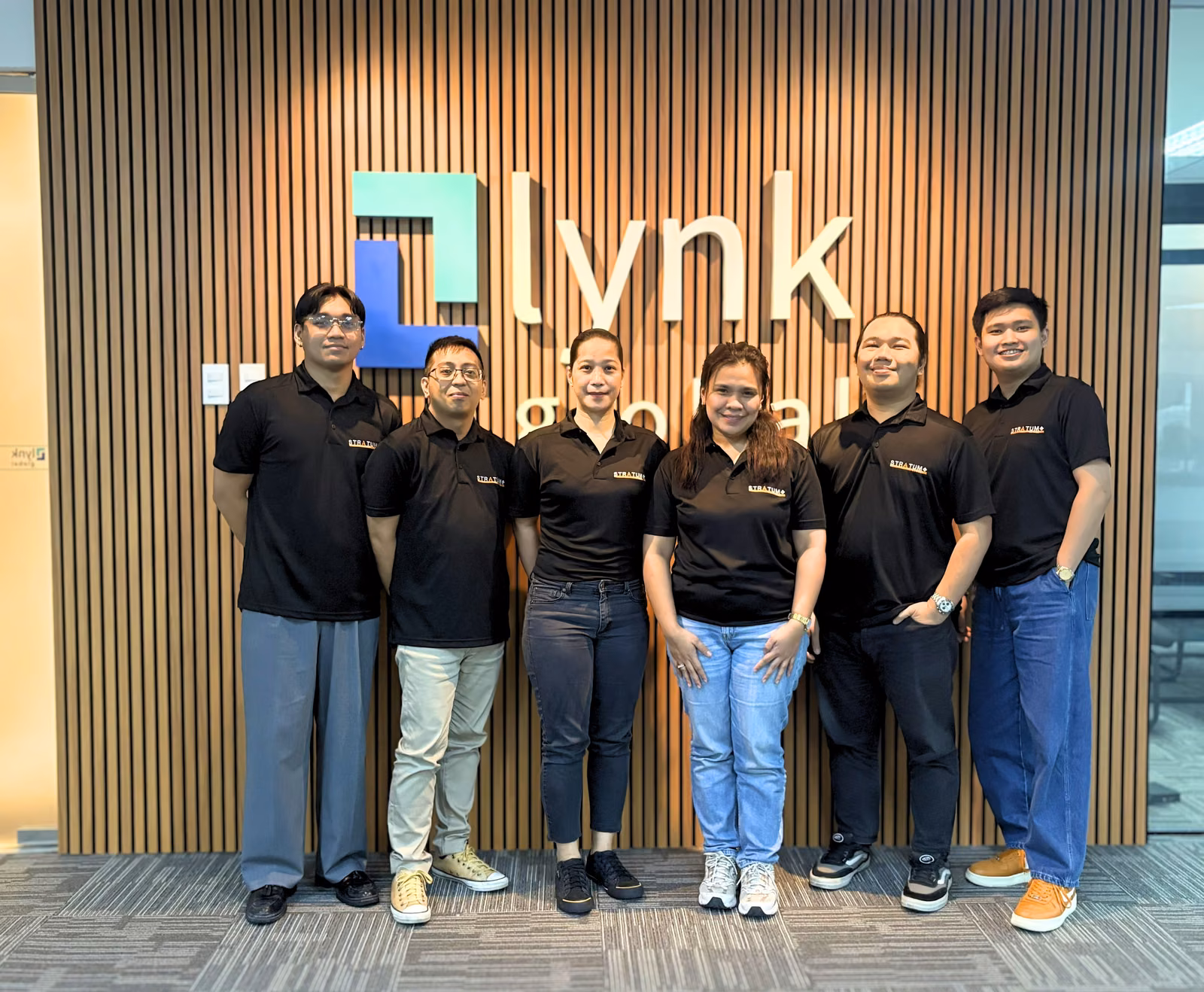 Lynk Global offshore project support team working in the Manila office