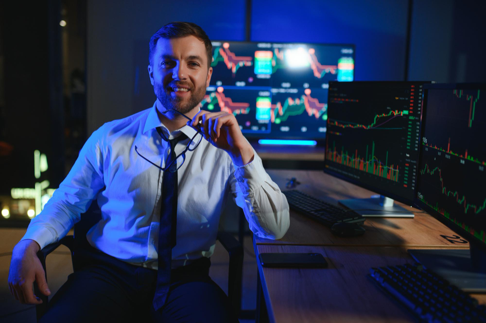 man holding his spectacles - How to Make Money Online Trading