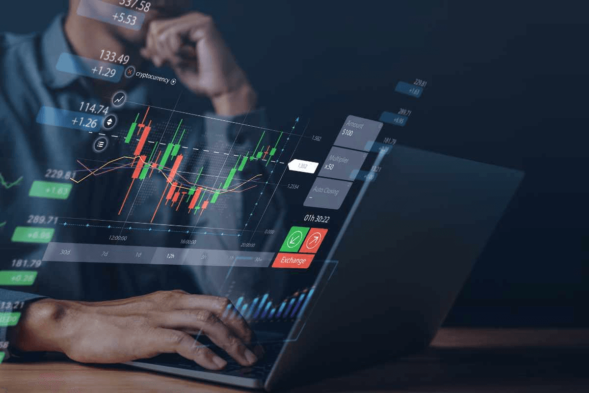 Man analyzing financial data charts - What Is Forex Trading and How Does It Work