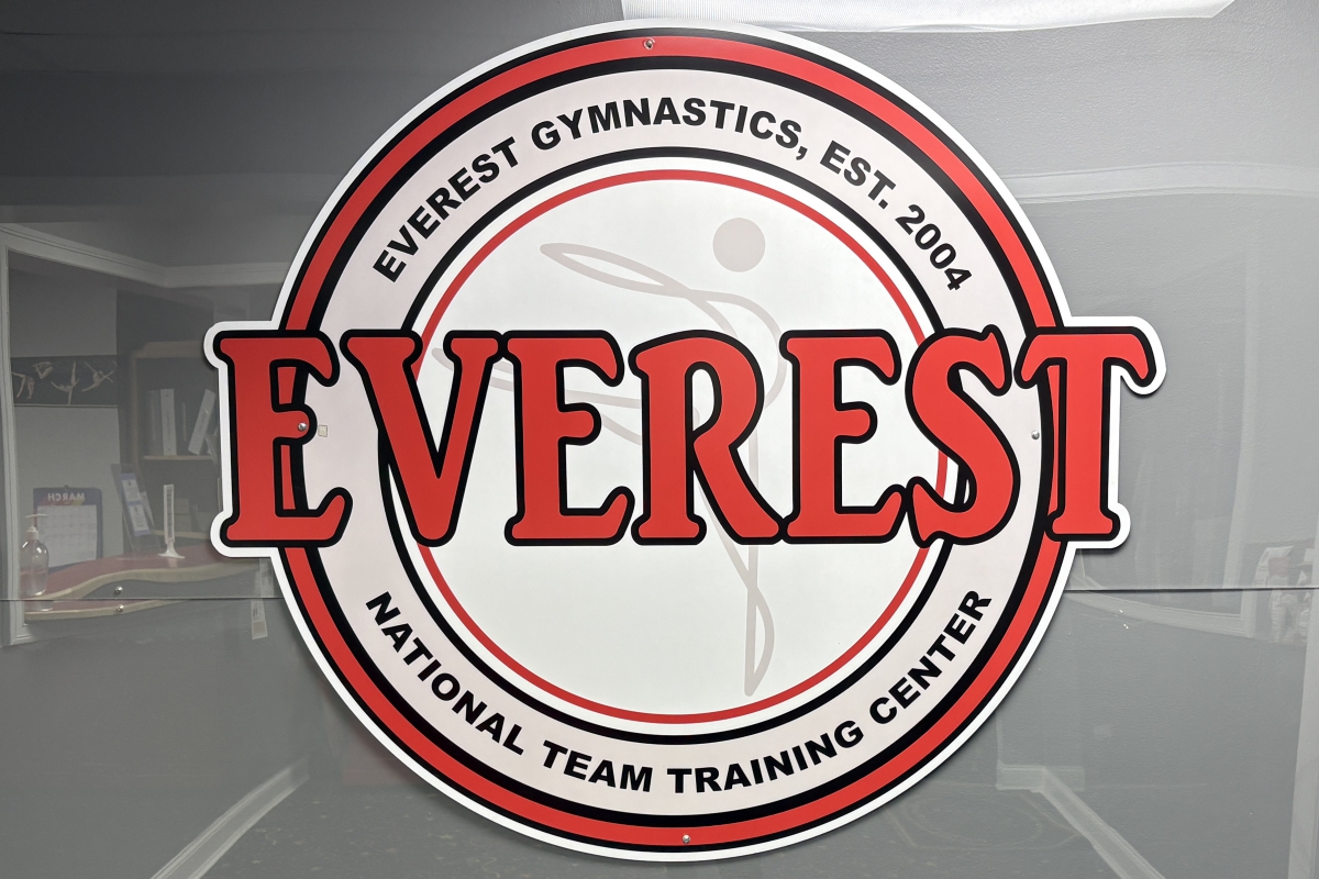 Everest Gymnastics sign with logo