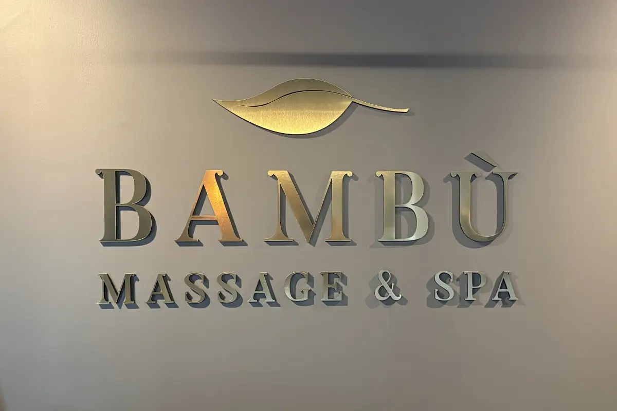 Bambu Massage & Spa interior wall with logo