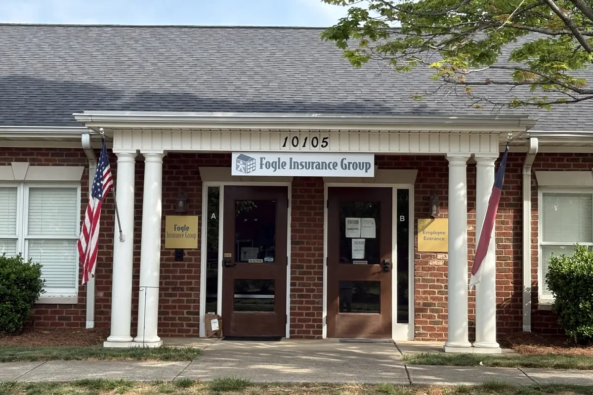 Entrance of Fogle Insurance Group office with exterior signage 