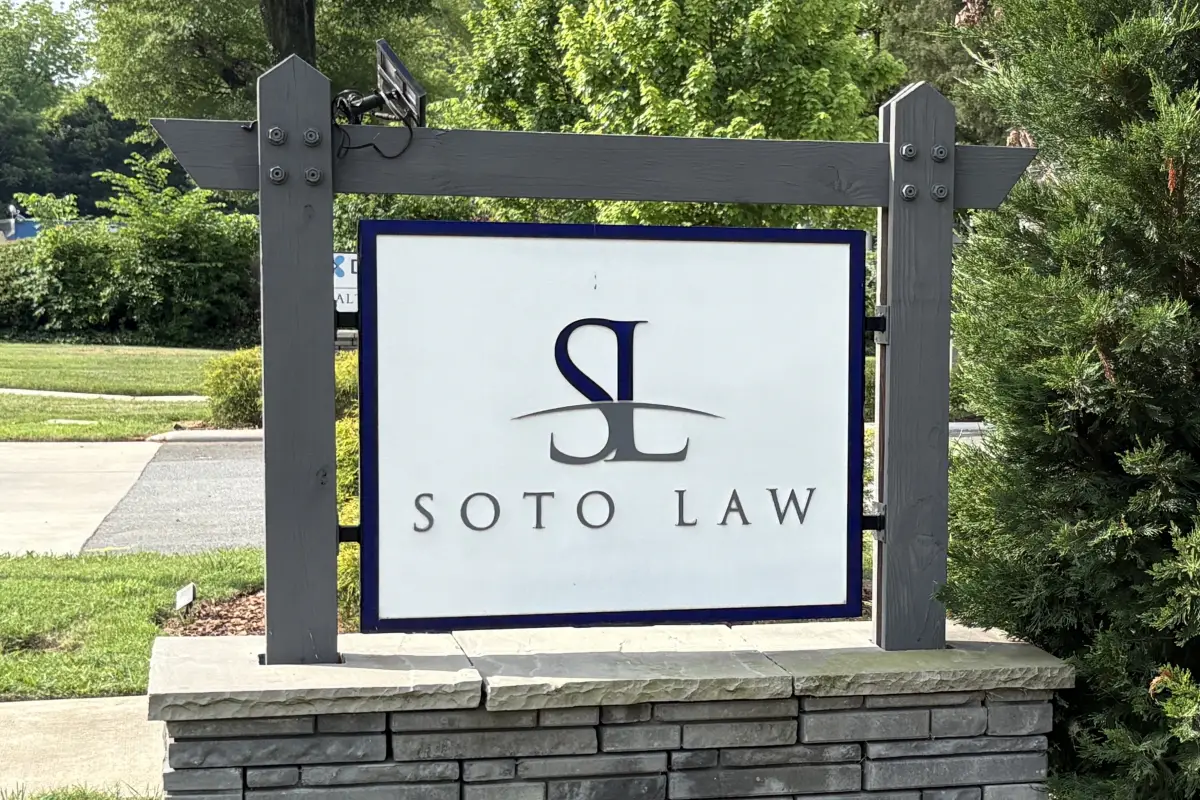Soto Law office sign at roadside entrance 