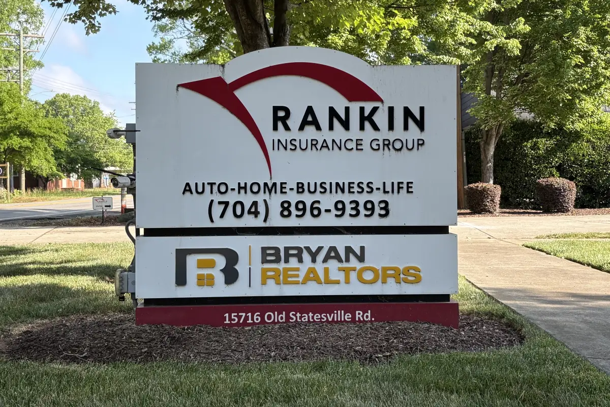 Rankin Insurance Group roadside sign with business name and services