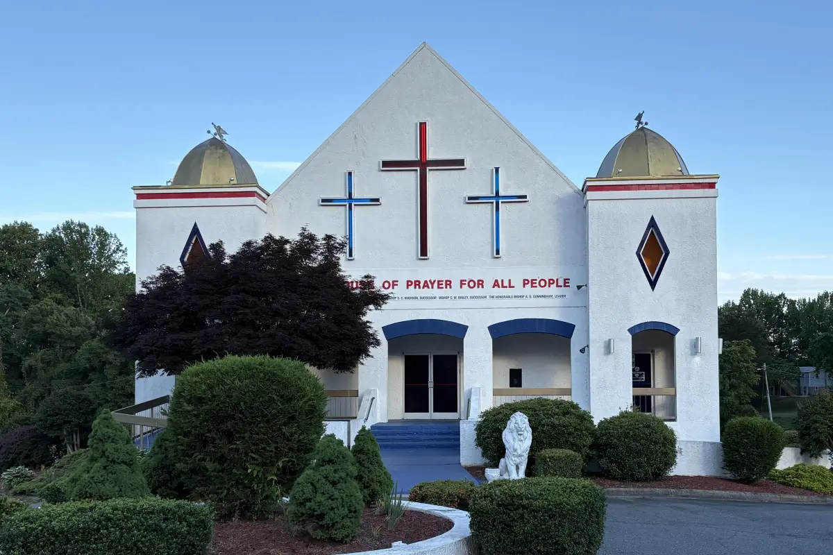 House of Prayer Church building with crosses on front exterior