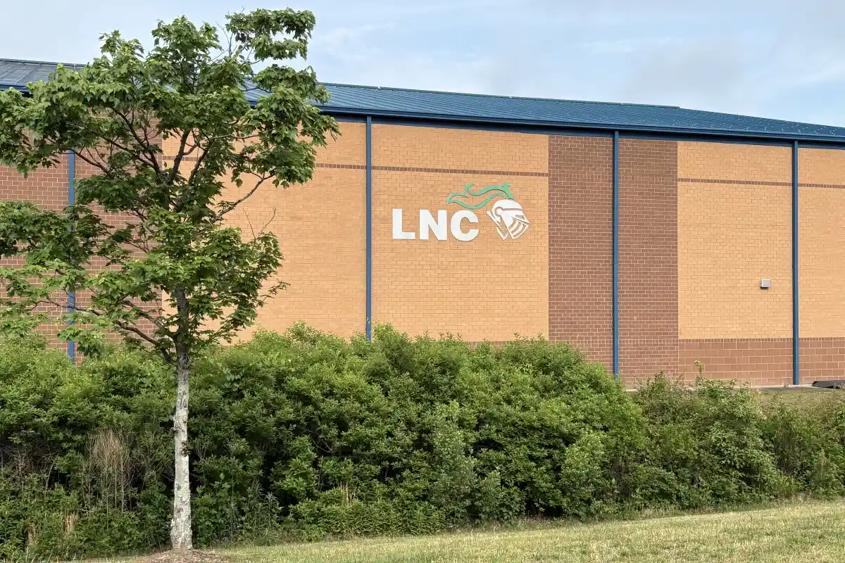 Building exterior of Lake Norman Charter High School with the LNC Knights logo on the side