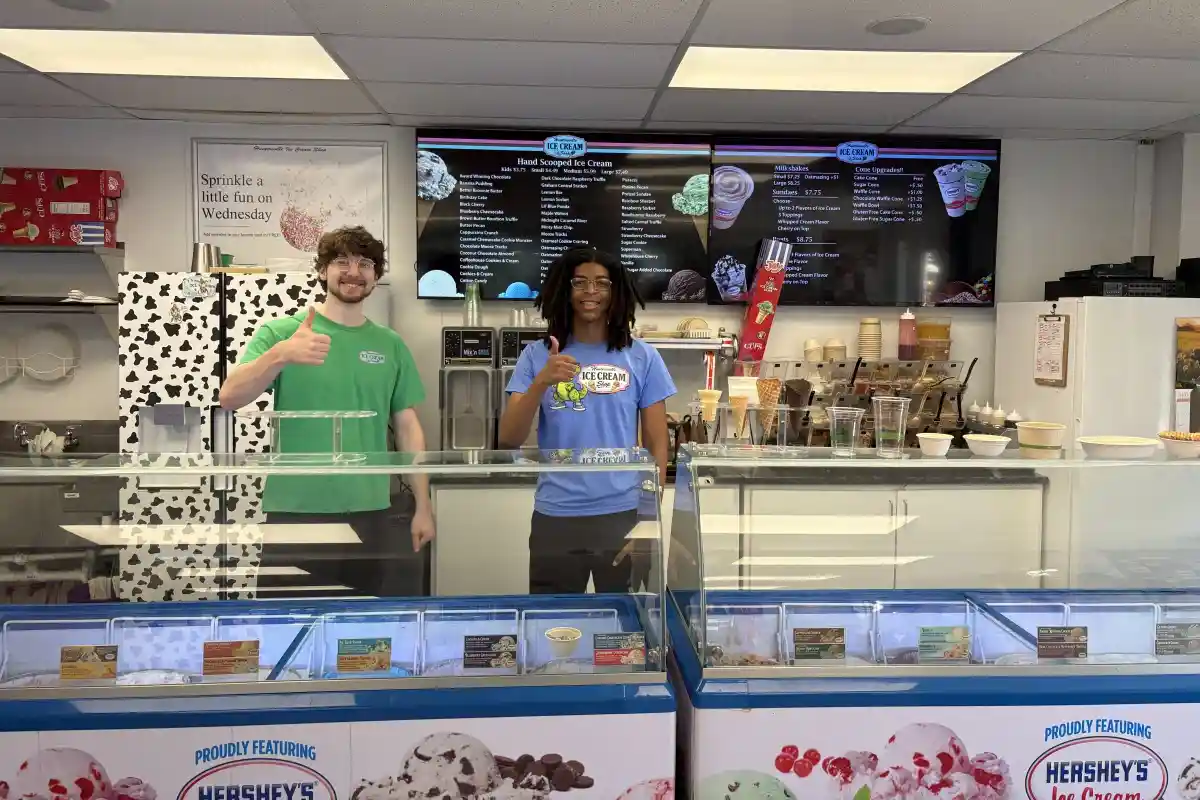 Staff standing behind the counter at Huntersville Ice Cream Shop