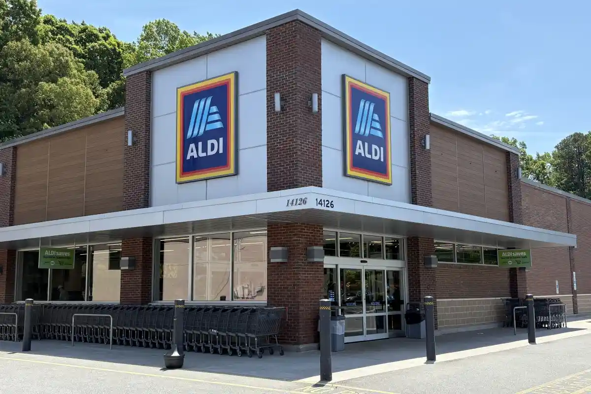 Exterior entrance and storefront signage for ALDI grocery store