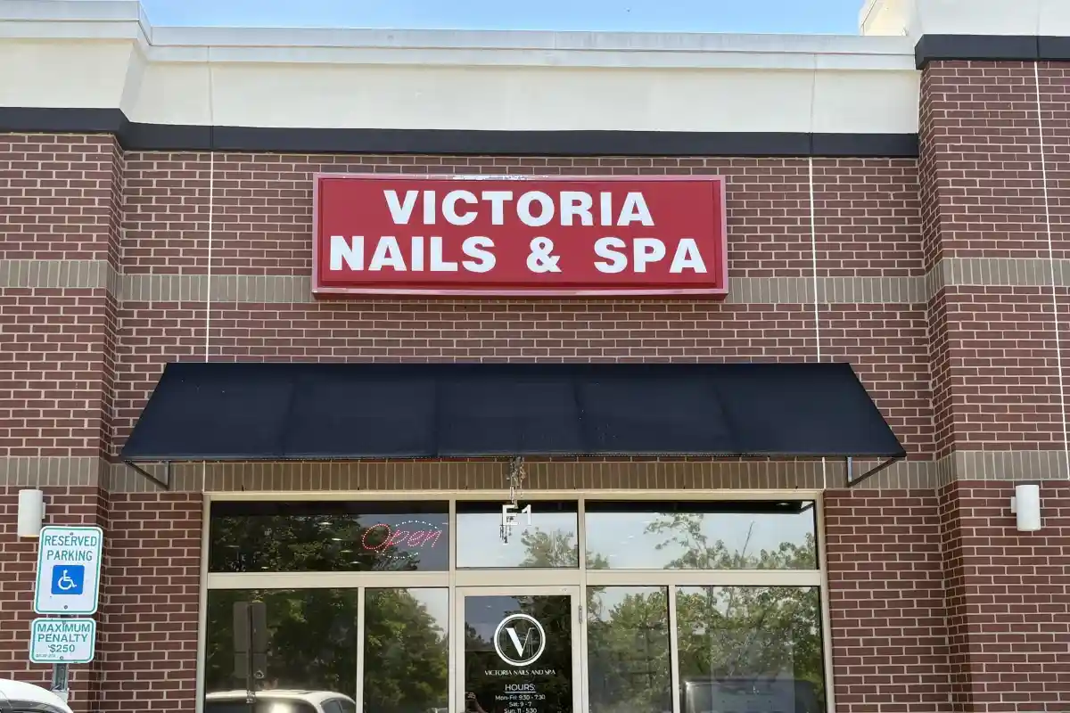 Exterior storefront and entrance signage for Victoria Nails & Spa