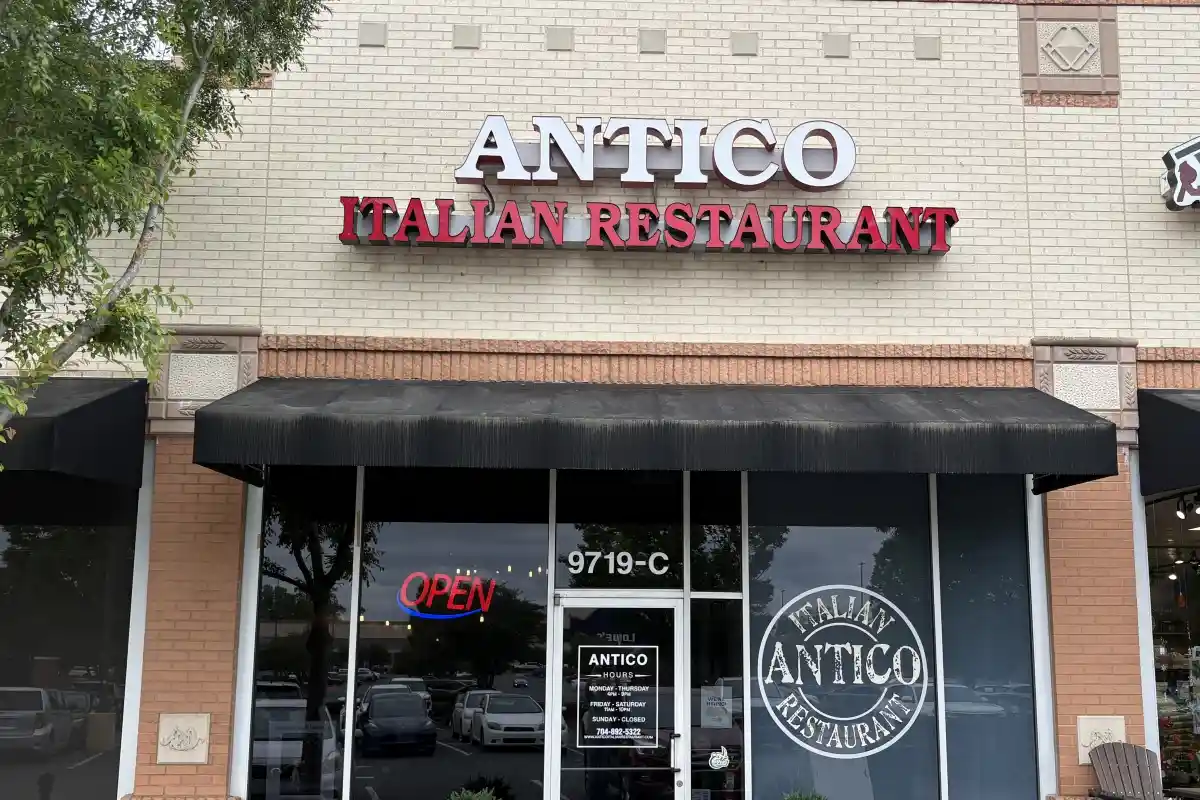 Exterior entrance and signage for Antico Italian Restaurant