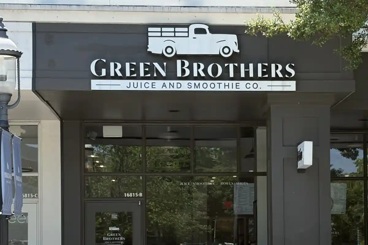 Exterior sign and entrance to Green Brothers Juice Co