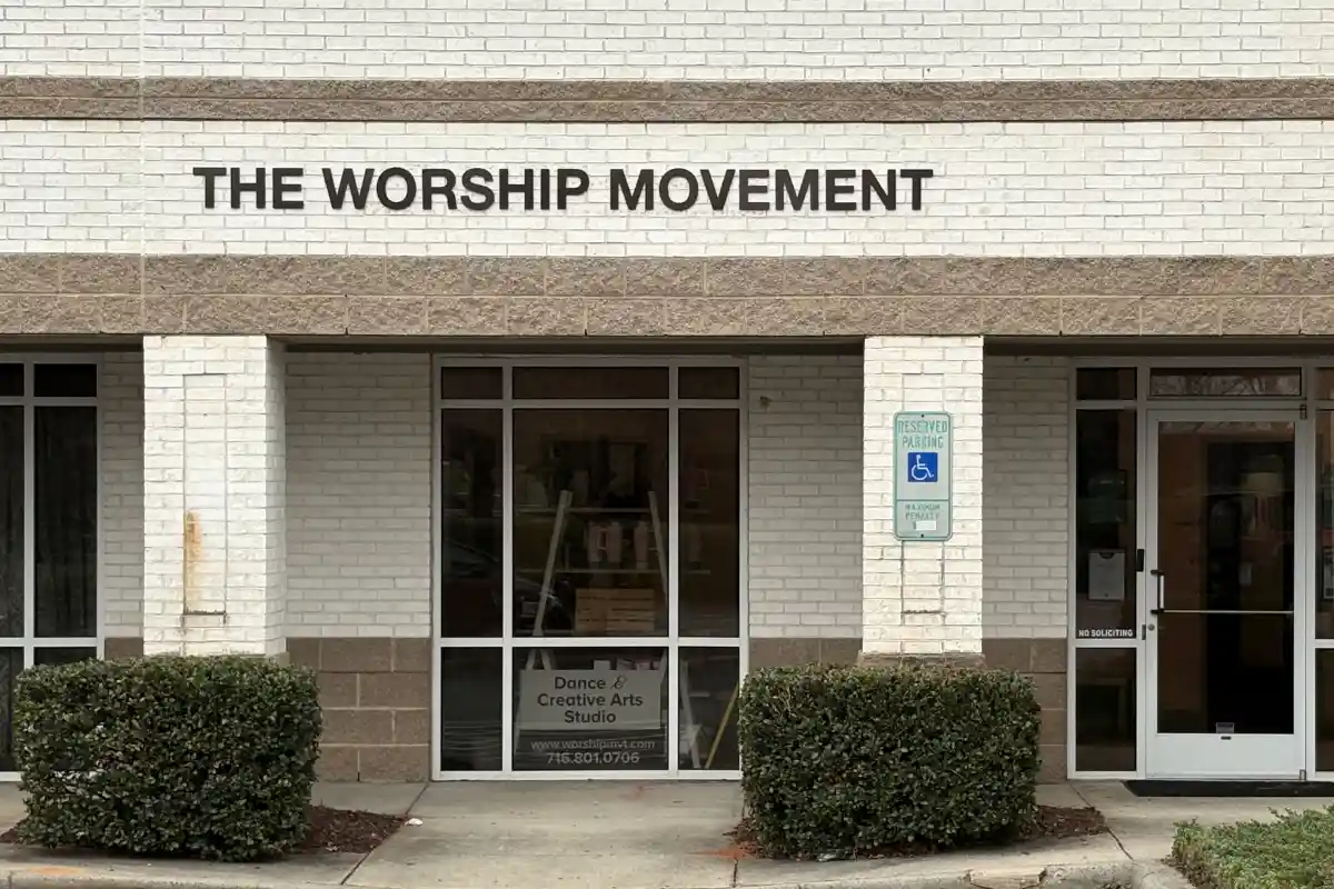 Entrance and sign for The Worship Movement