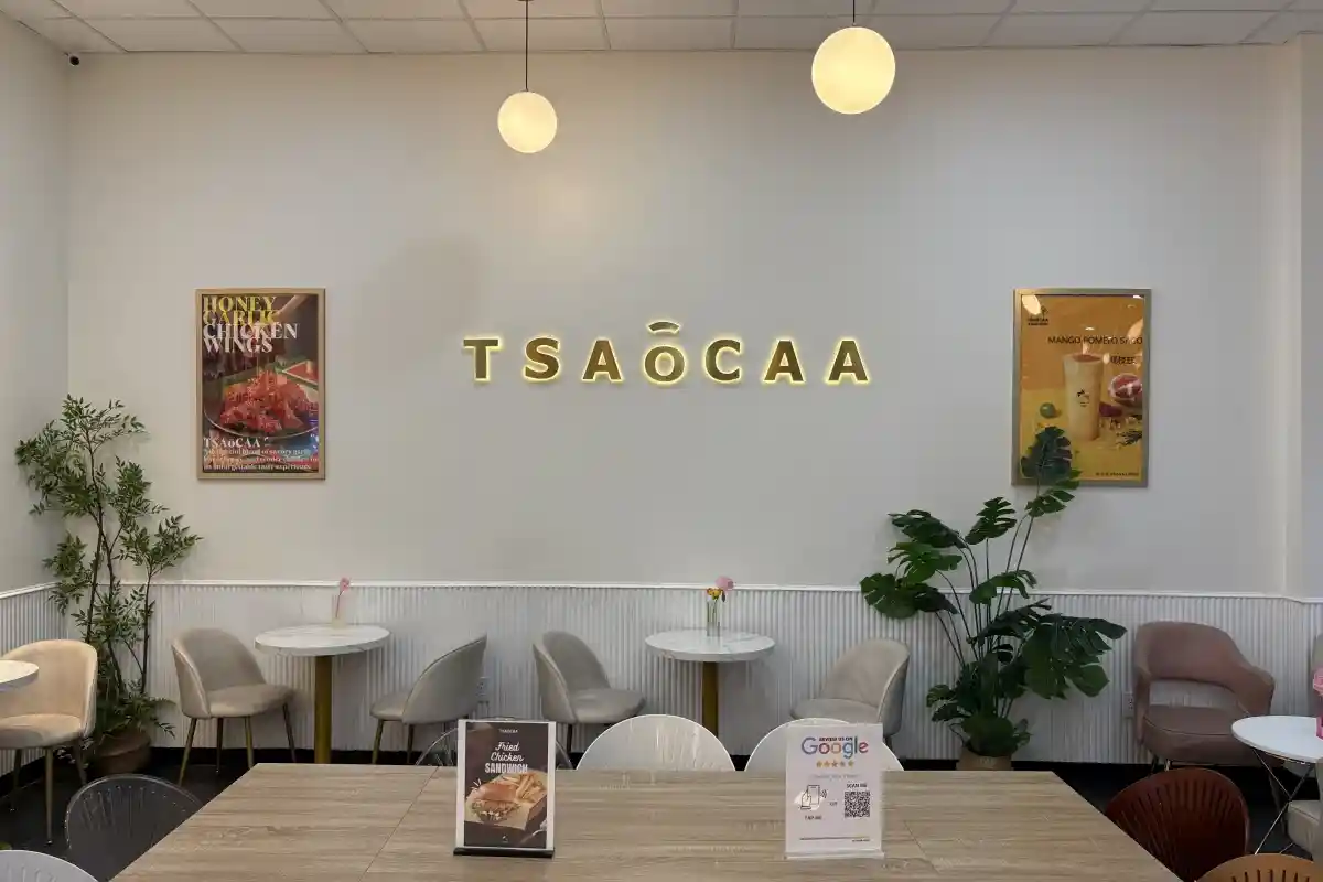 Interior seating area and branded wall sign for TSAOCAA