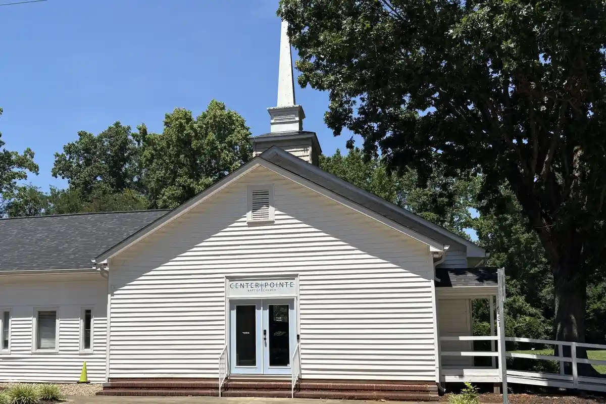Exterior and entry door to Centerpointe Baptist Church
