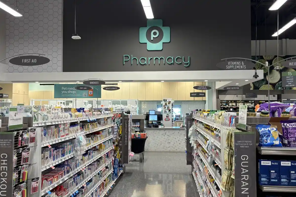 Aisle leading up to the reception desk at Publix Pharmacy in North Creek Village