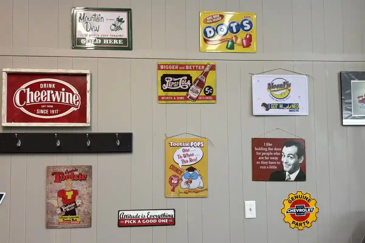 Vintage decor and signs on the wall at Scottie's Barber Shop