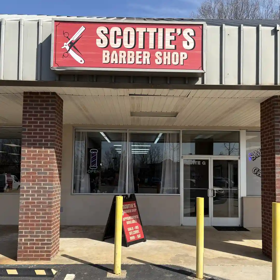 Scottie's Barber Shop exterior and sign in Huntersville NC