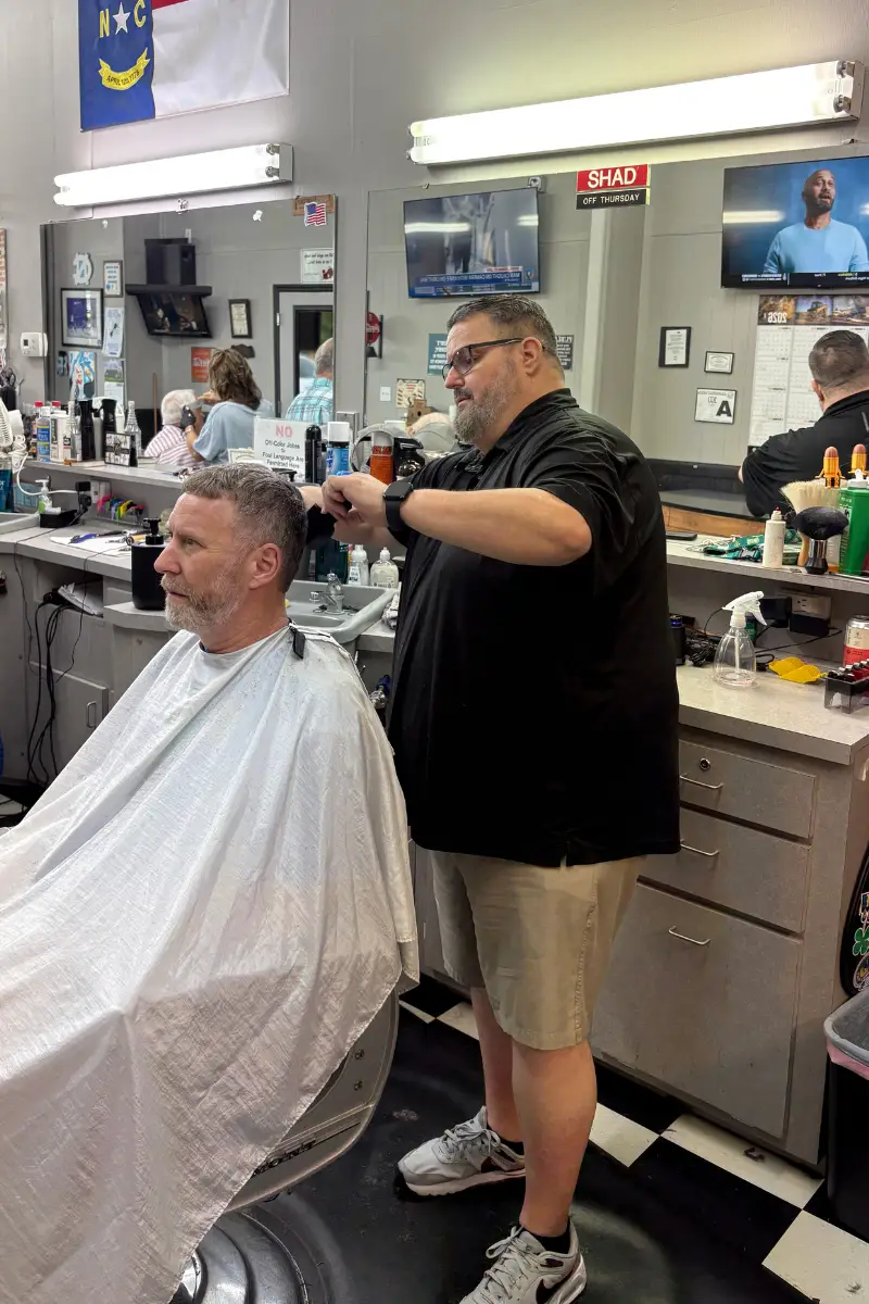Shad cutting hair at Scottie's Barber Shop
