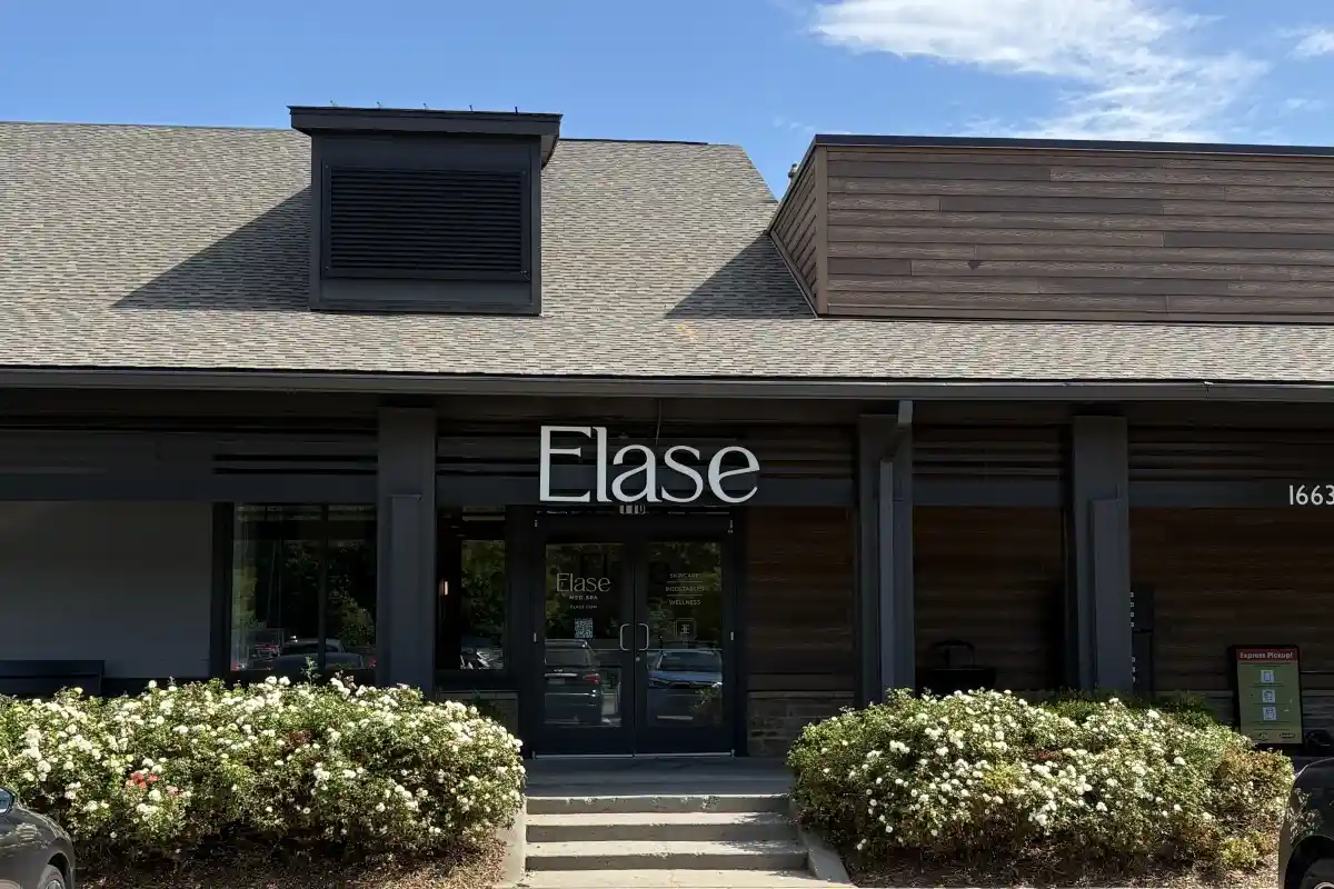 Exterior entrance to Elase with building signage