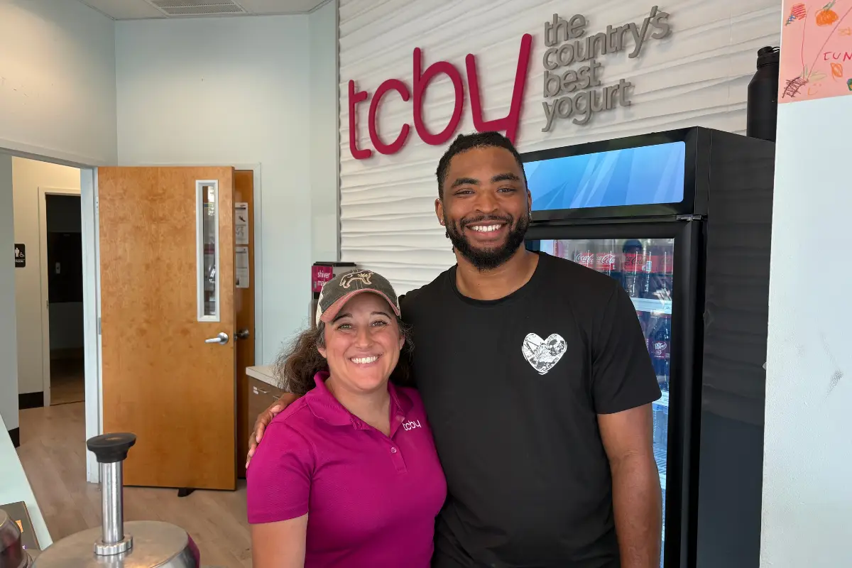 Owner Jocelynn Holleran and staff member at TCBY Rosedale Shopping Center