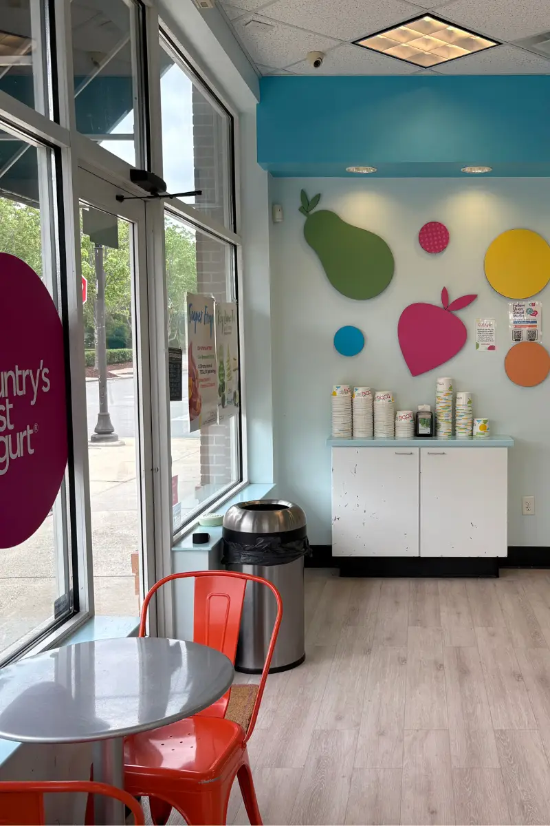 Interior seating area and decor inside TCBY Rosedale