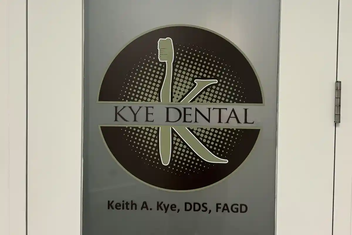 The logo for Kye Dental on their office door