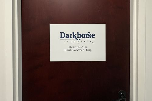 Sign for Darkhorse Attorneys on office door