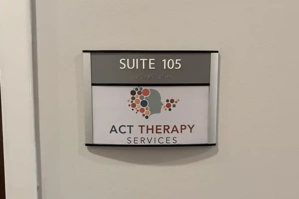 Sign on office door for ACT Therapy Services