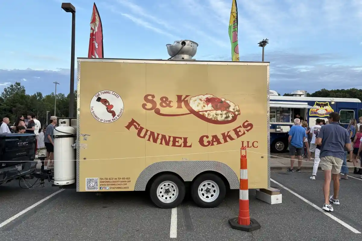 Side of a food truck with S&K Funnel Cakes