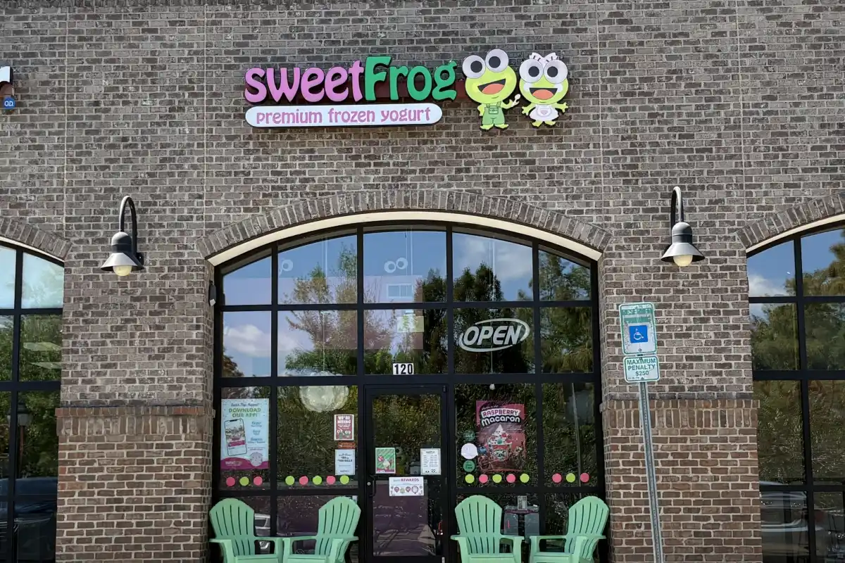Storefront of Sweet Frog frozen yogurt shop