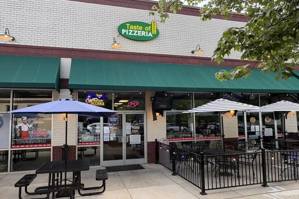 Exterior and outdoor seating area of Taste of Buffalo Pizzeria