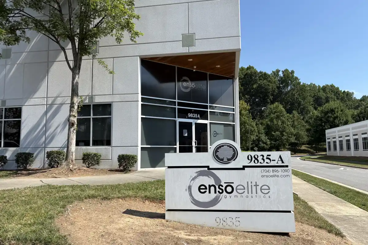 Building exterior, entrance, and sign for Enso Elite Gymnastics