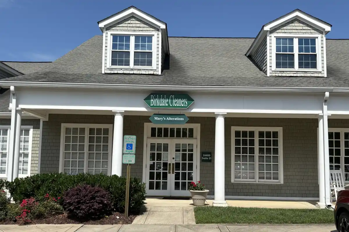 Building exterior entrance to Birkdale Cleaners