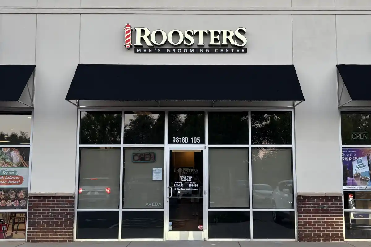 Storefront of Roosters Men's Grooming Center