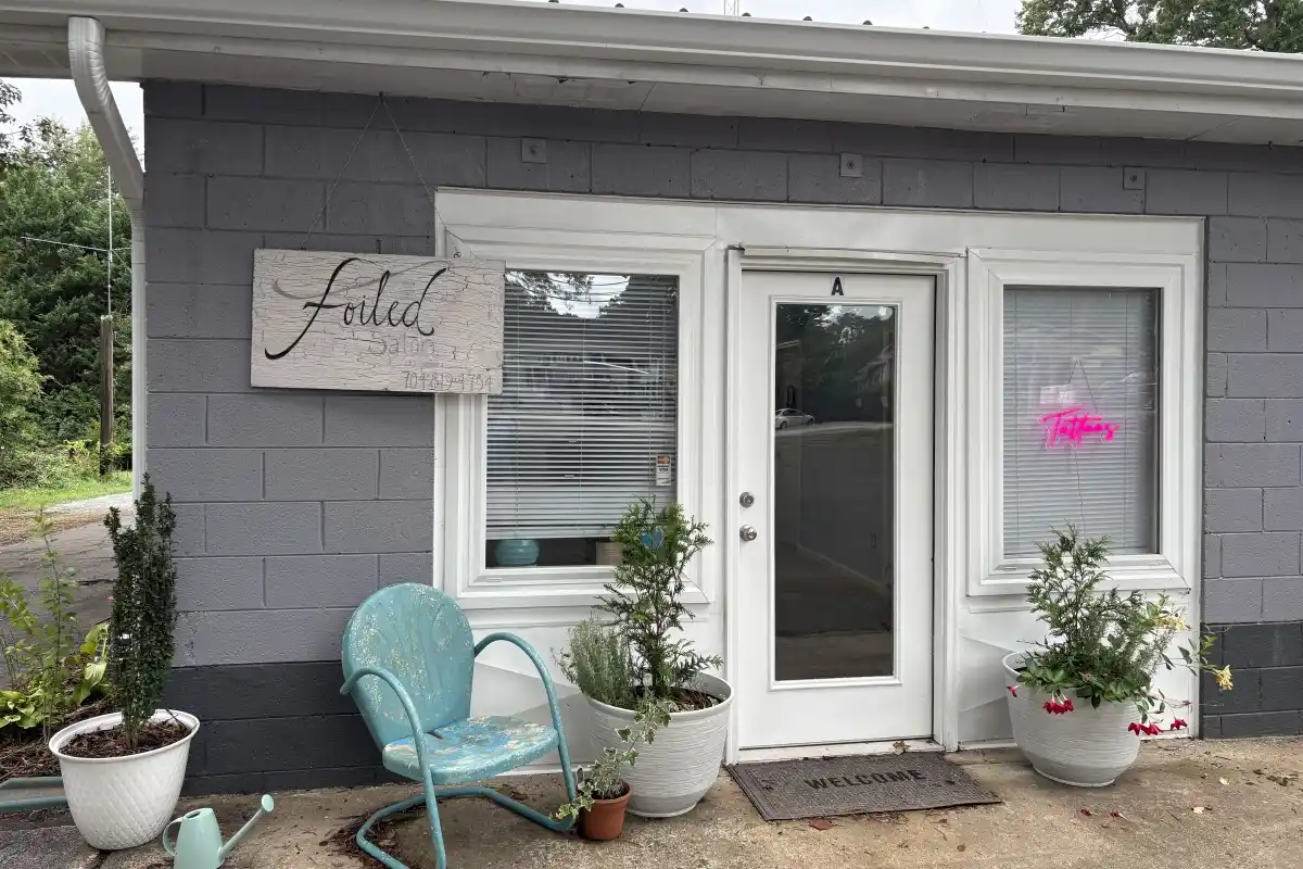 Building entrance to Foiled Salon