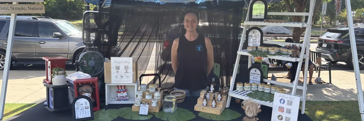 Beefy Bliss vendor tent selling beef tallow skin care products at the Huntersville Growers' Market